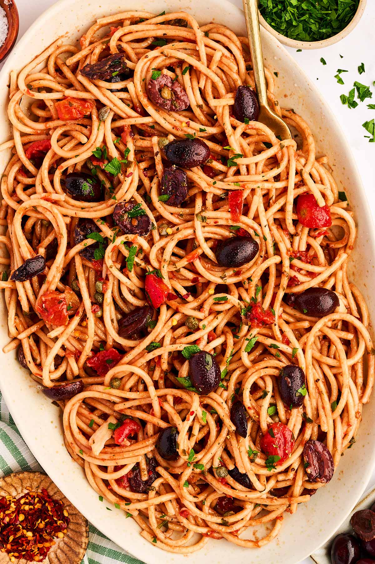 Platter with pasta puttanesca.