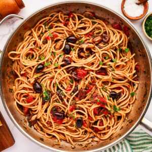 Skillet with pasta puttanesca.