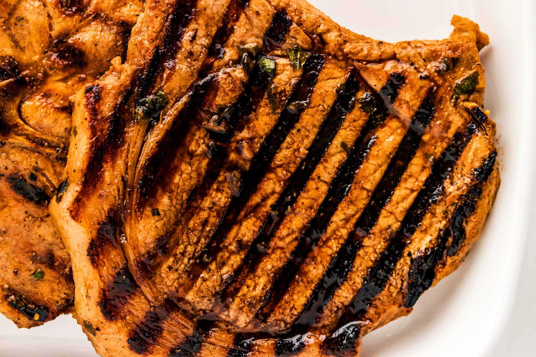 Grilled pork chop close up.