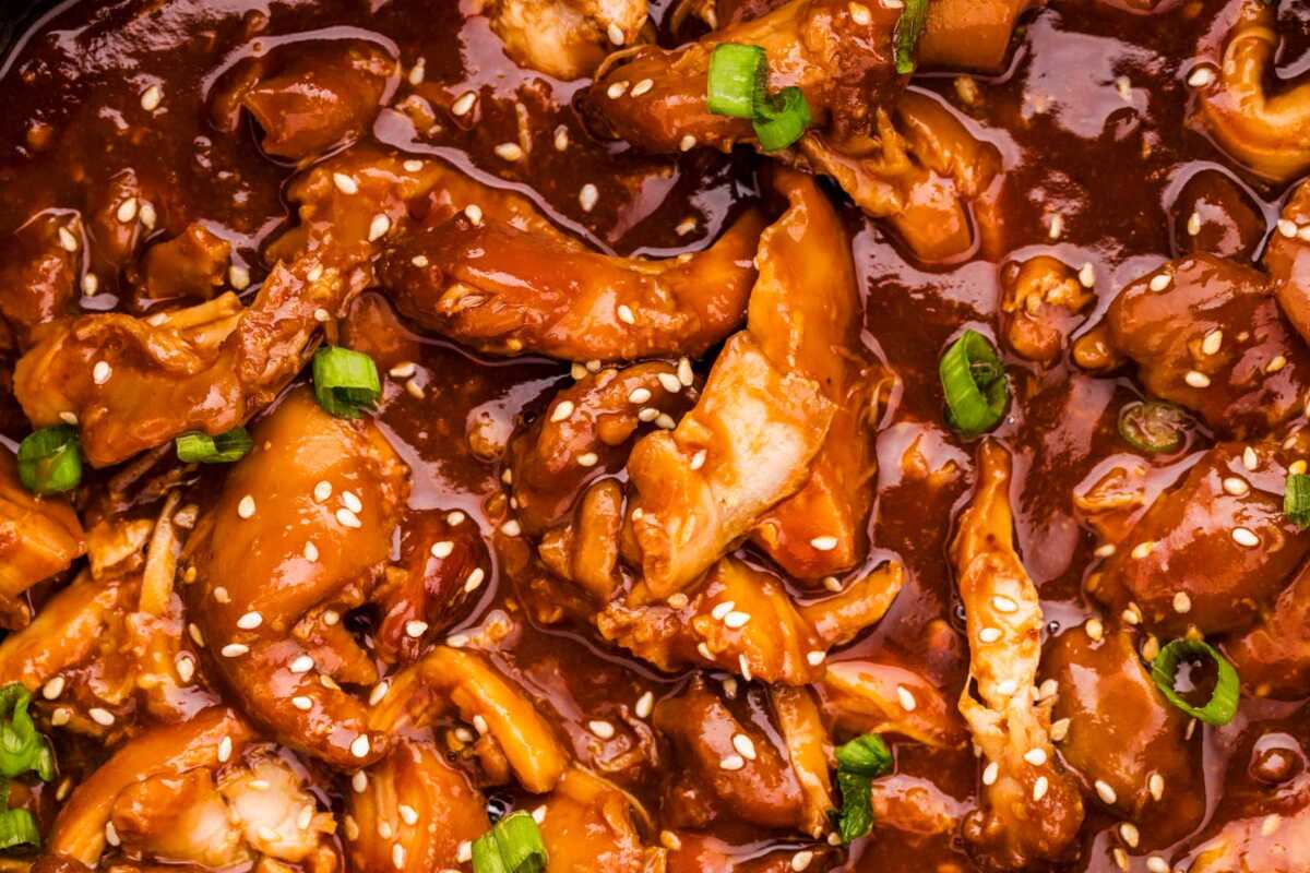 Close up photo of honey garlic chicken cooked in the slow cooker.