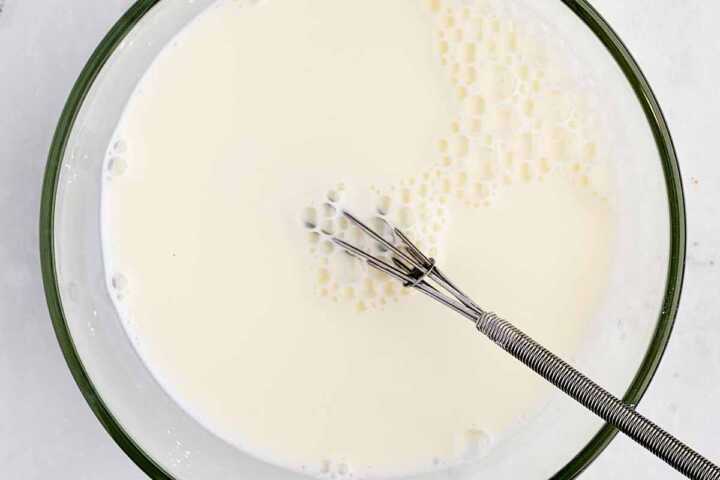 Cornstarch slurry in a glass bowl.