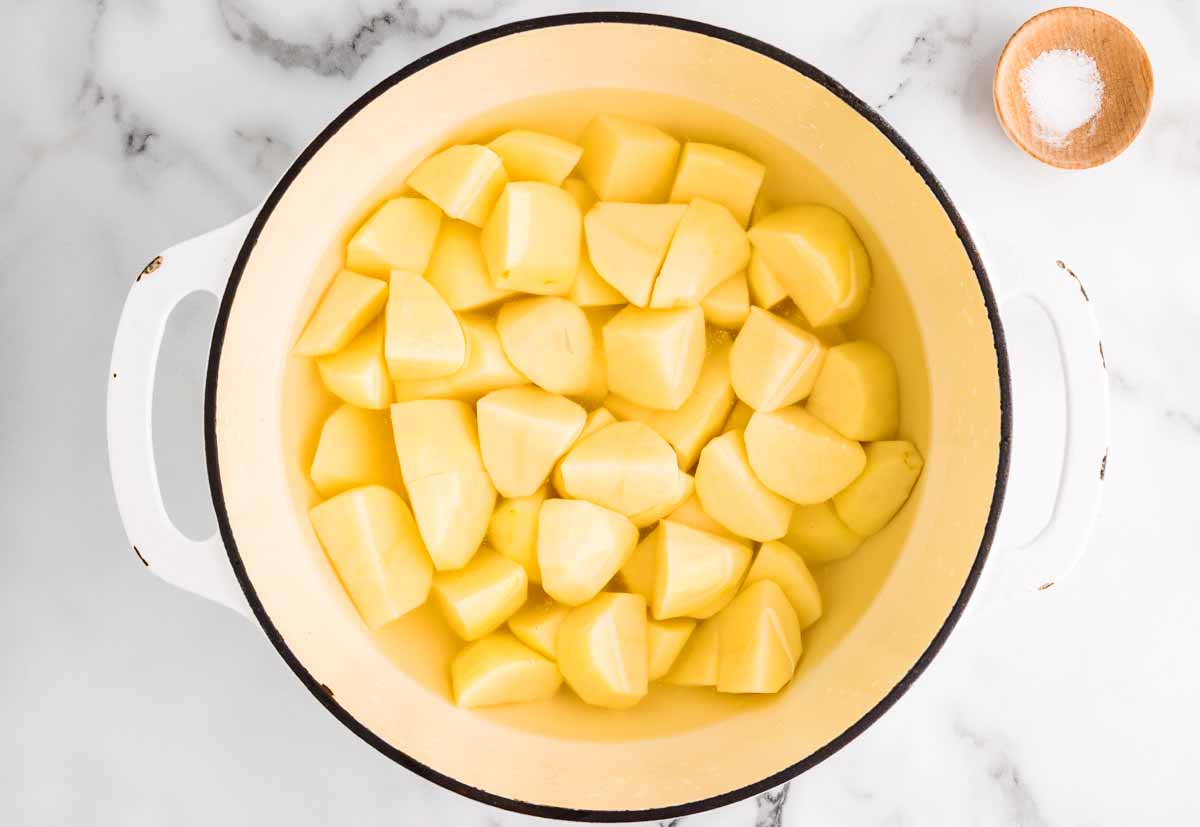 Steaming potatoes in a pot.