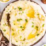Serving mashed potatoes in a bowl.