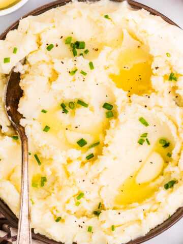 Serving mashed potatoes in a bowl.