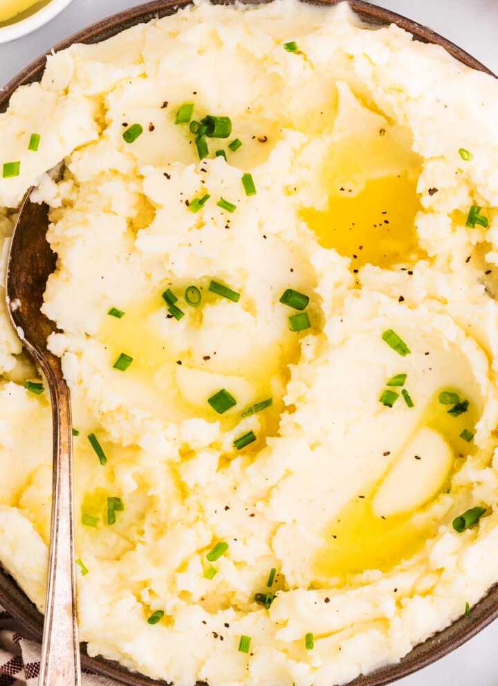 Serving mashed potatoes in a bowl.