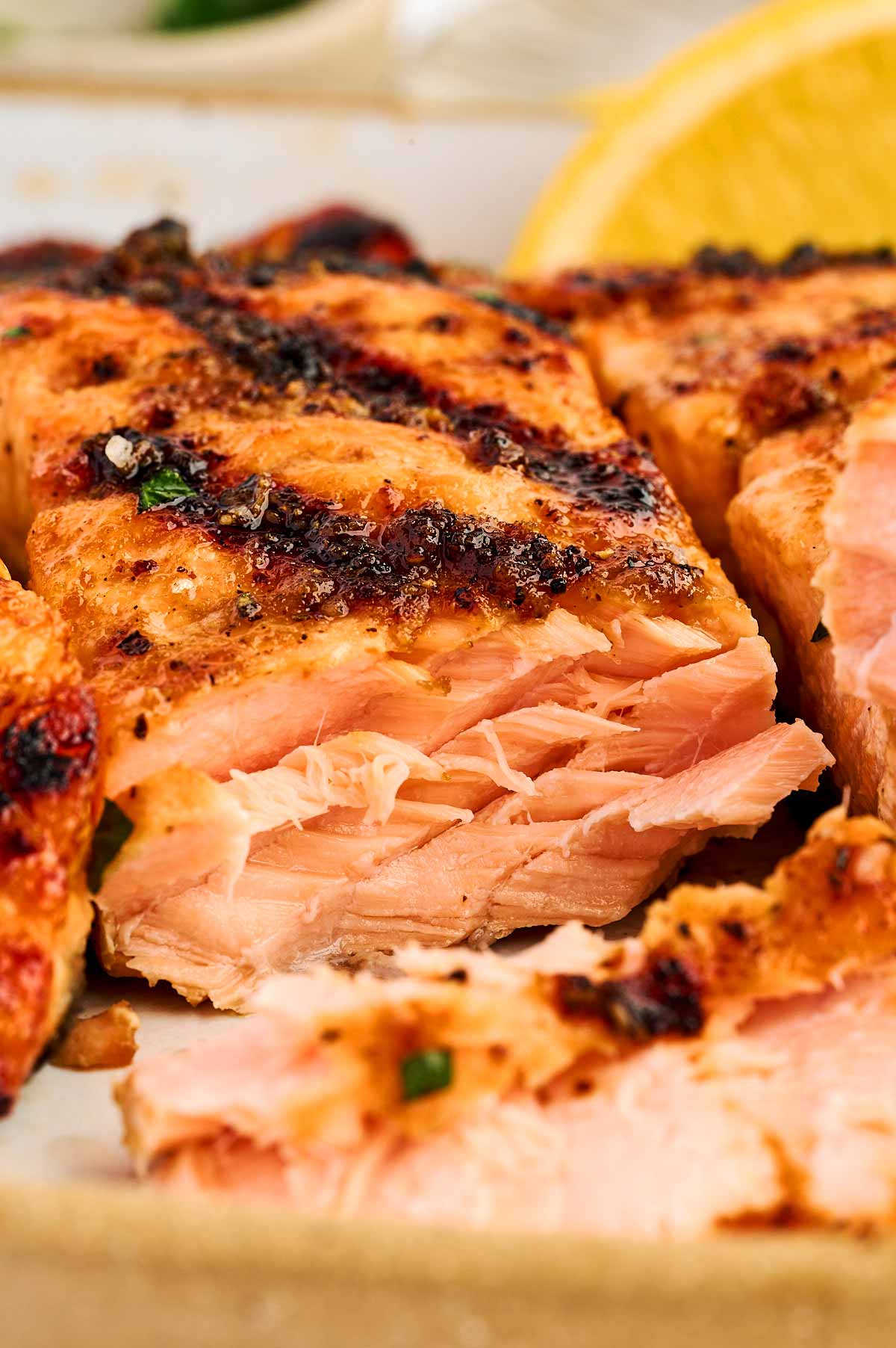 Close up photo of the inside of a grilled salmon fillet.