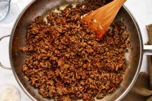 Making ground beef filling for enchiladas.