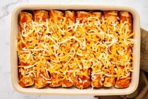 Assembled ground beef enchiladas before baking.