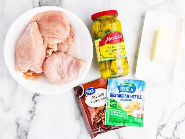 Ingredients for Mississippi Chicken on a marble surface.