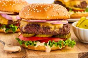 Burger on a wooden board.