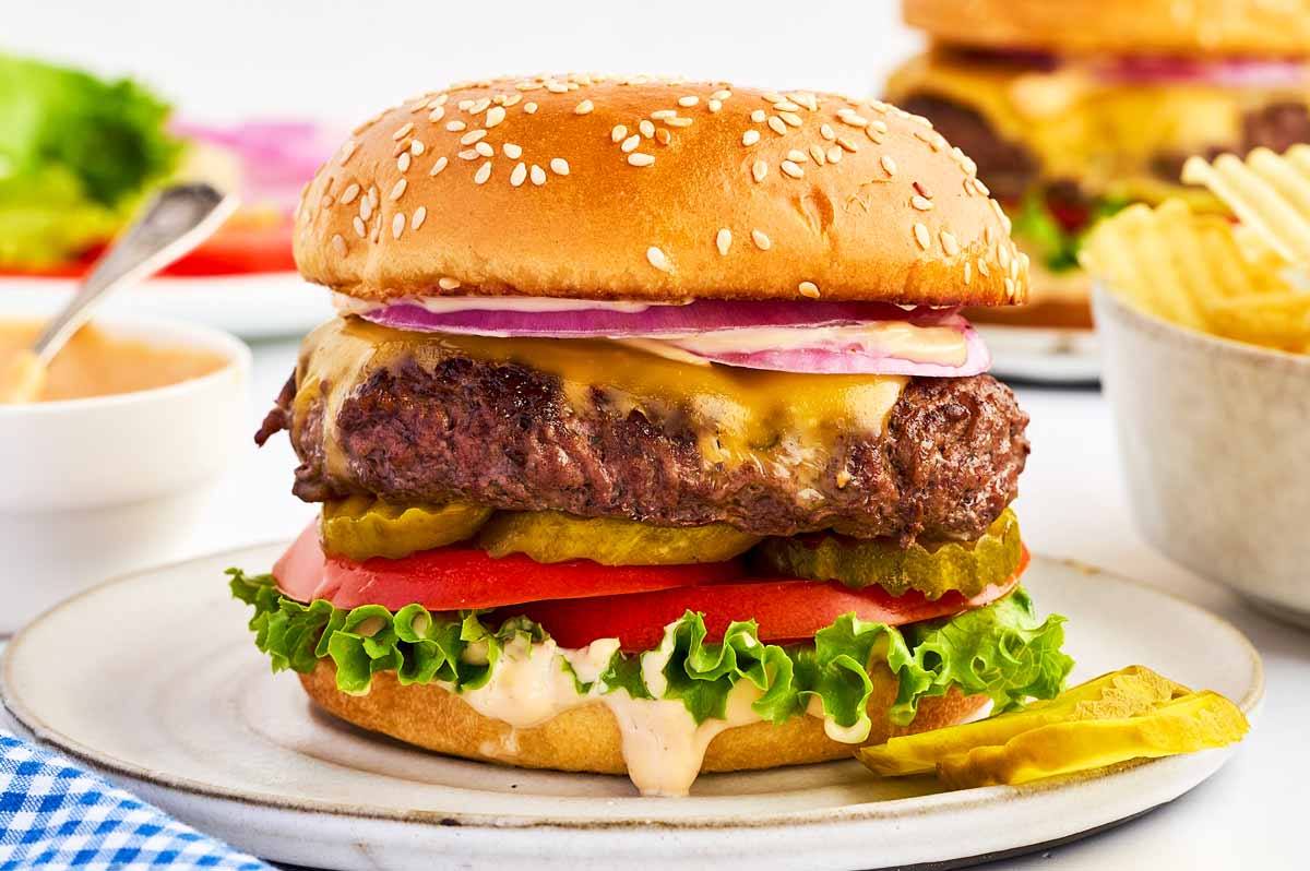 Burger on a white plate.