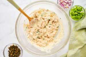 Tuna folded into mayo dressing.
