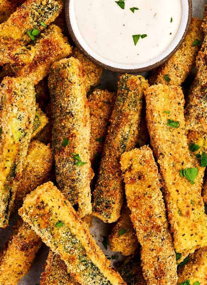 Baked Parmesan Zucchini Fries on a platter with ranch dip.