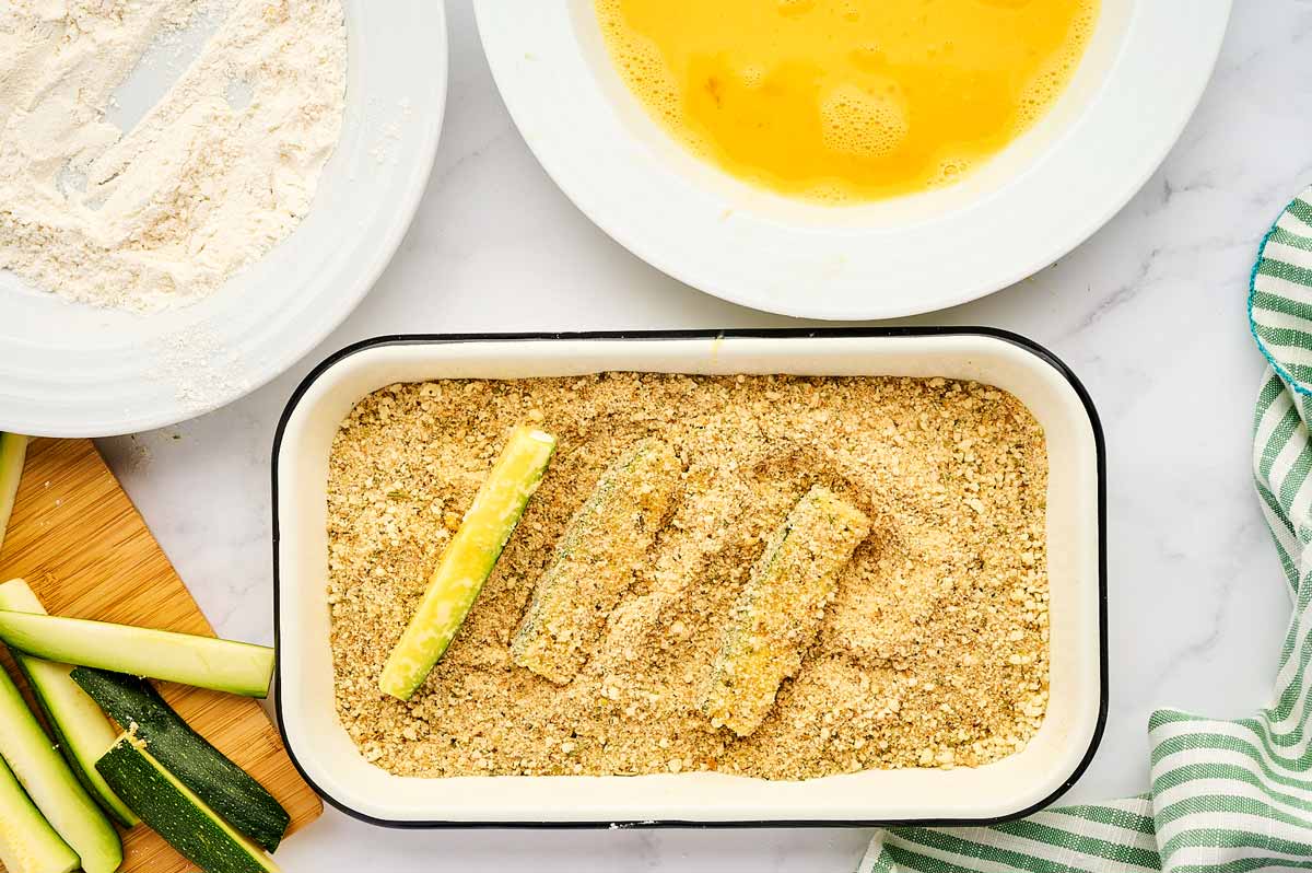 Zucchini fries in seasoned breadcrumbs.
