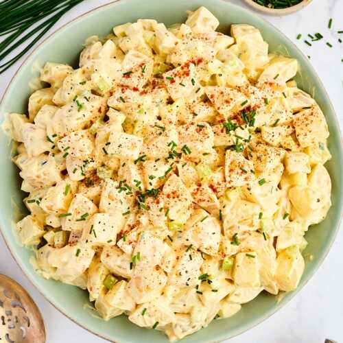 Bowl with creamy potato salad.