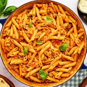 Skillet filled with Italian Sausage Pasta.