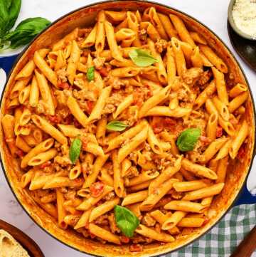 Skillet filled with Italian Sausage Pasta.