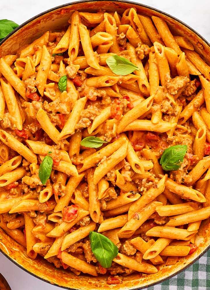 Skillet filled with Italian Sausage Pasta.
