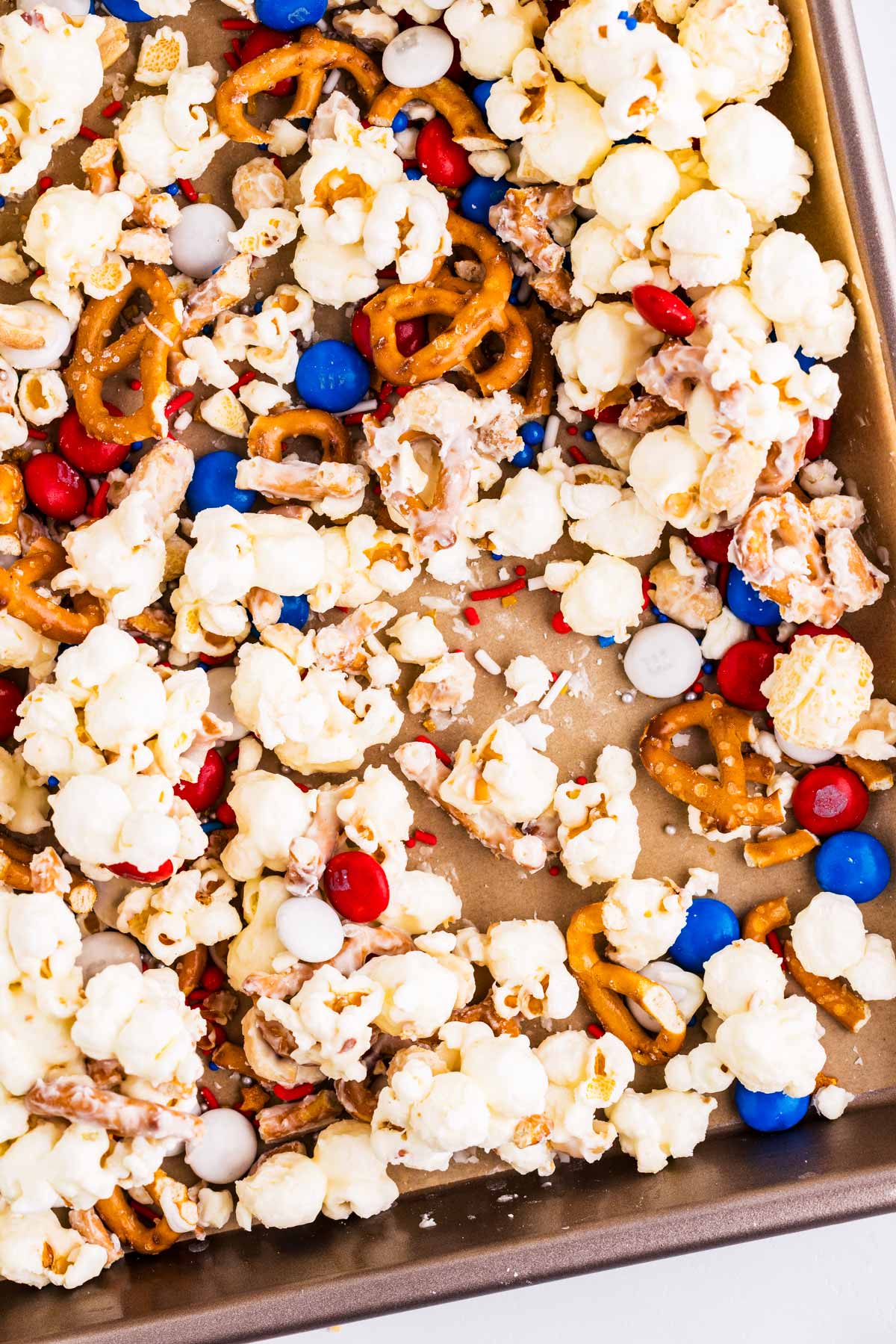 Close up of patriotic popcorn on a sheet pan.