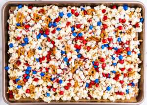 Red, White and Blue Popcorn on a sheet pan.