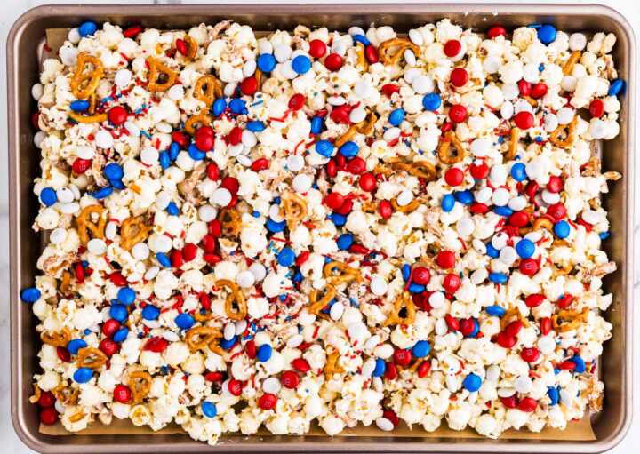 Red, White and Blue Popcorn on a sheet pan.