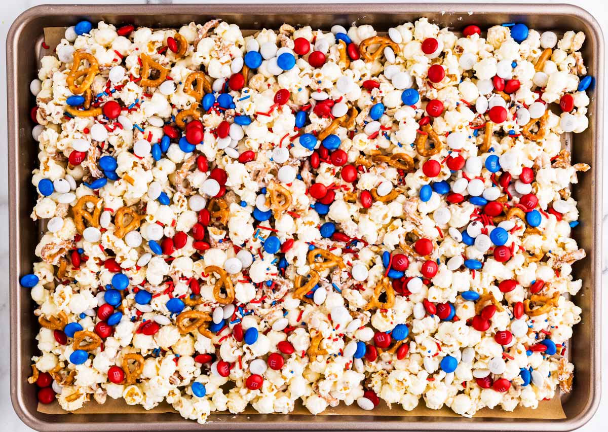 Red, White and Blue Popcorn on a sheet pan.
