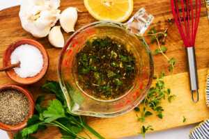 Steak marinade in glass measuring jug.