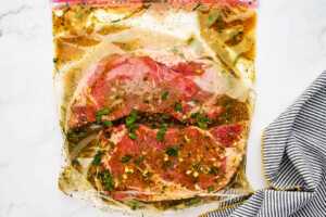 Steak in marinade in bag.