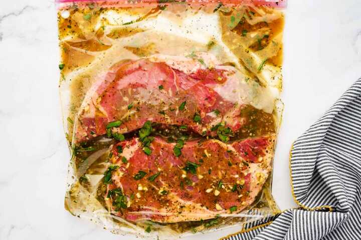 Steak in marinade in bag.