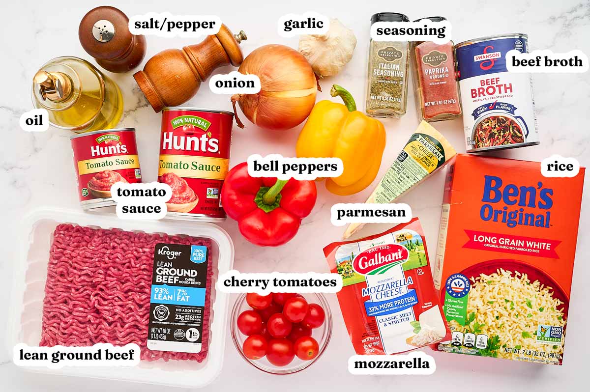 Ingredients to make Unstuffed Pepper Skillet on marble surface with text labels.