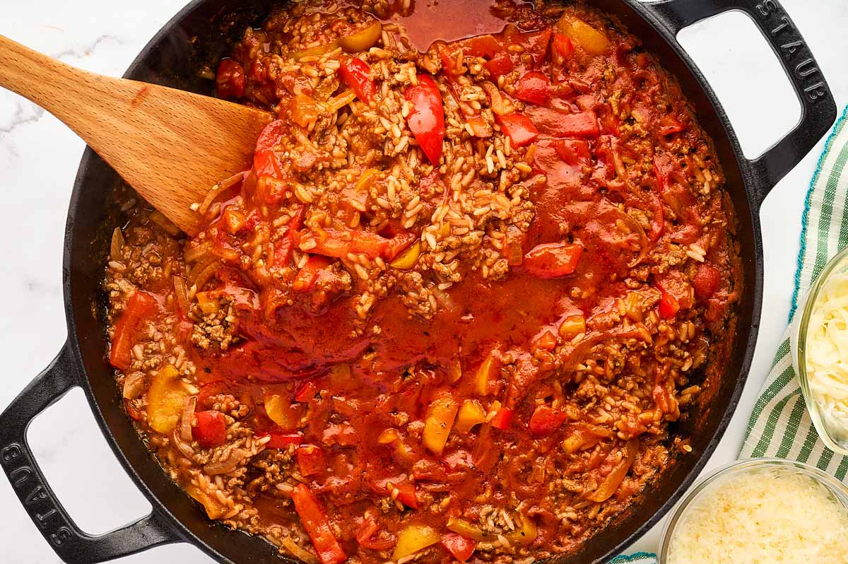 Cooked unstuffed peppers in skillet.