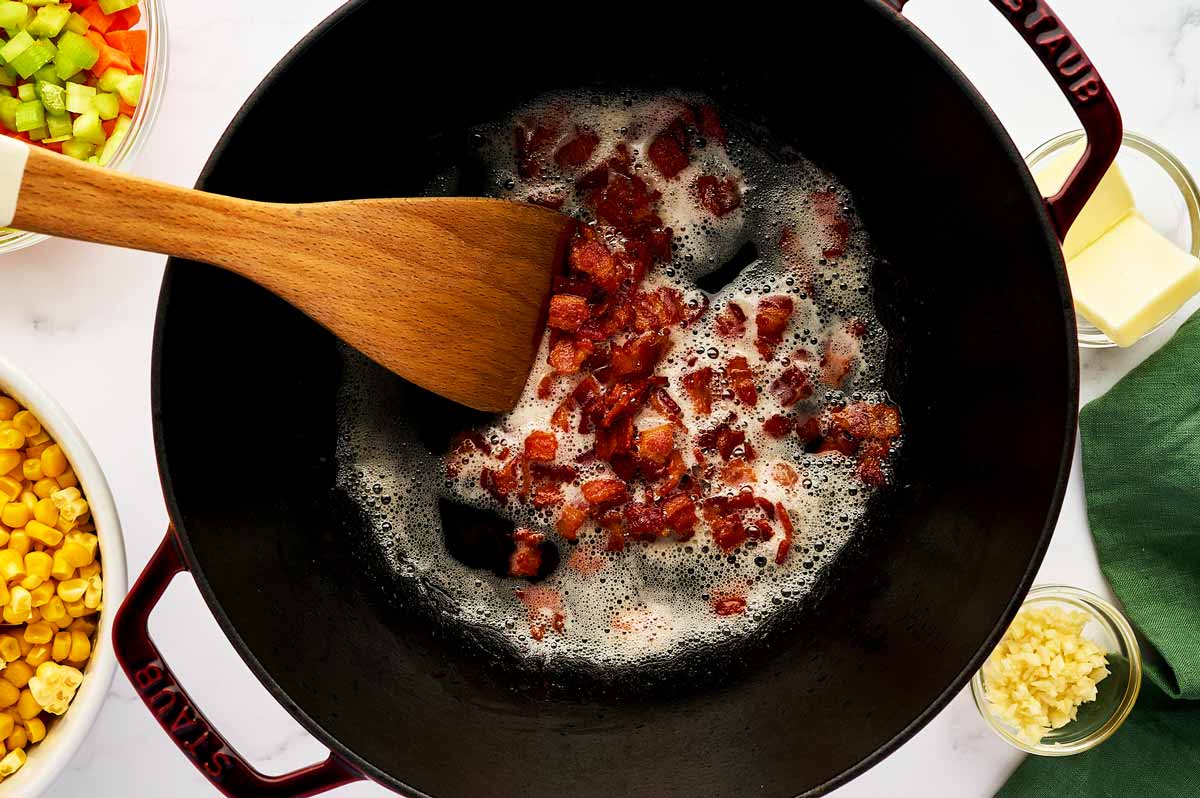 Cooking bacon until crispy.