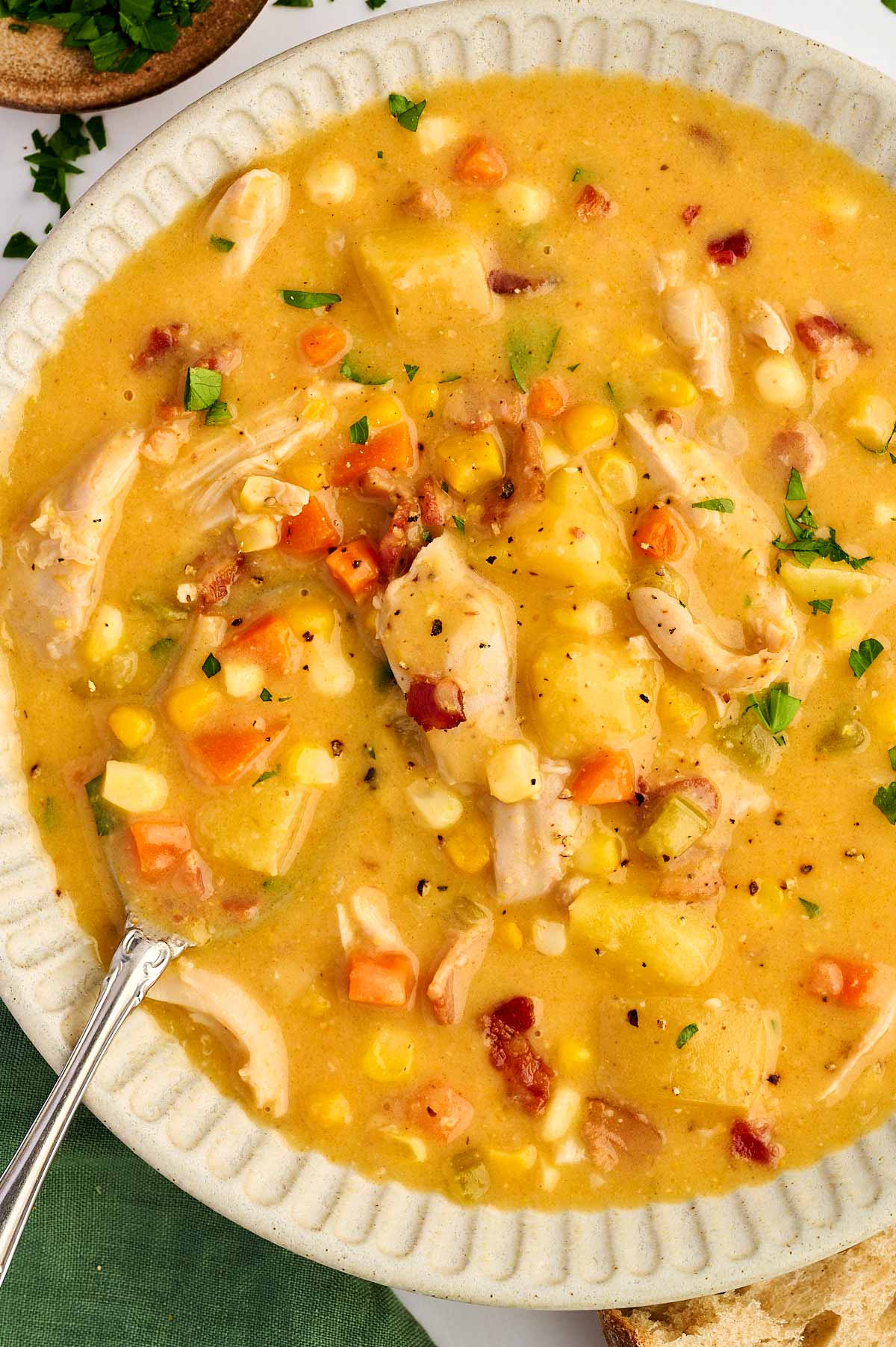 Bowl with chicken and corn chowder.