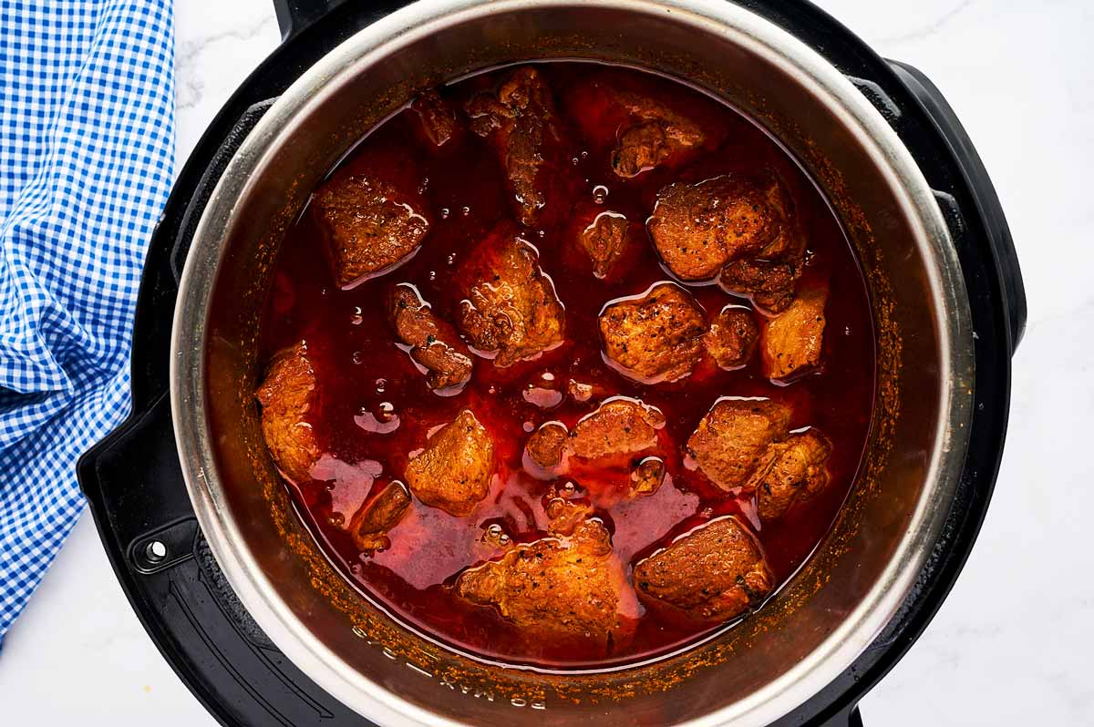 Cooked pork in BBQ sauce in instant pot.