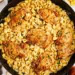 Serving chicken and pasta in a cast iron skillet.