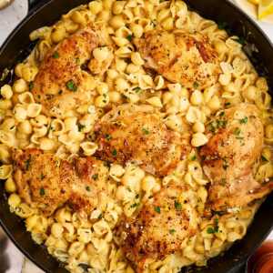 Serving chicken and pasta in a cast iron skillet.