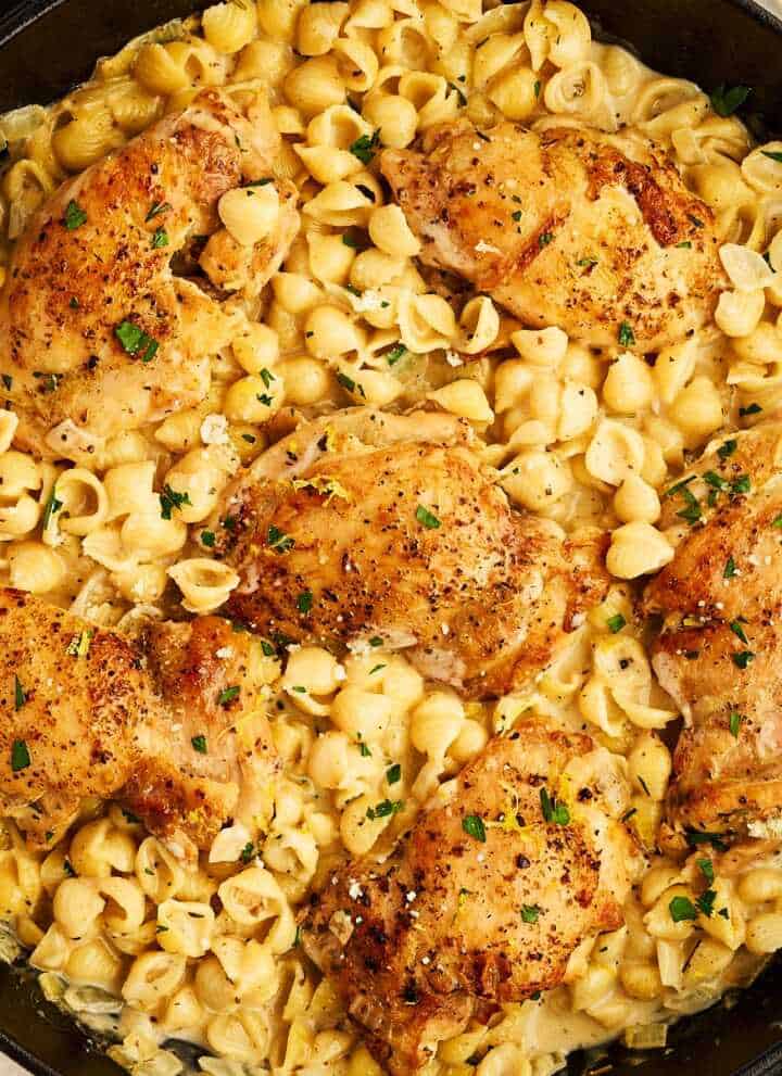 Serving chicken and pasta in a cast iron skillet.