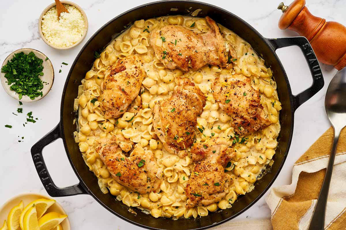 Serving chicken and pasta in a cast iron skillet.