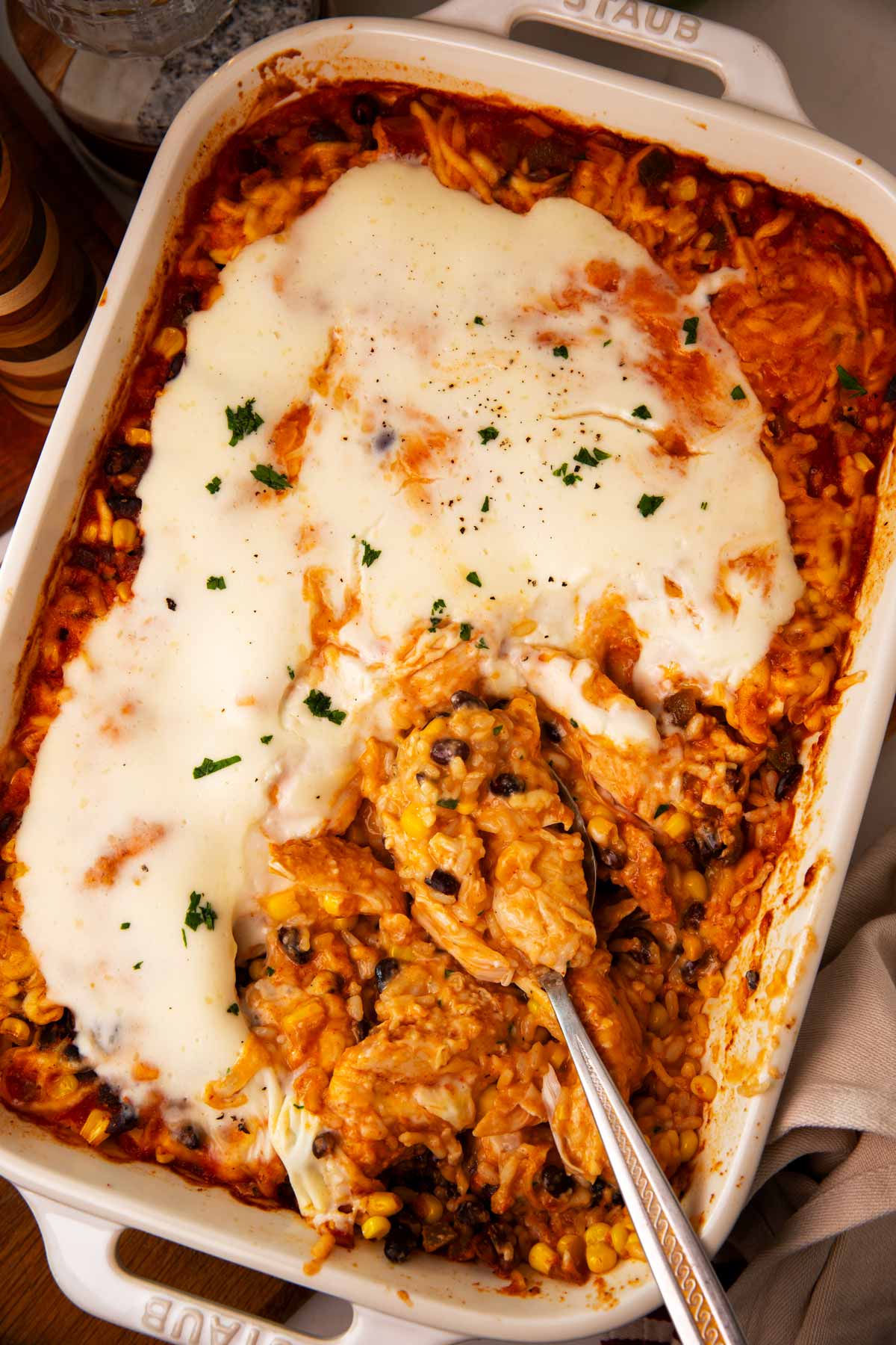 Overhead view of a swim queso chicken and rice casserole.