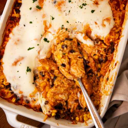 Overhead view of a swim queso chicken and rice casserole.