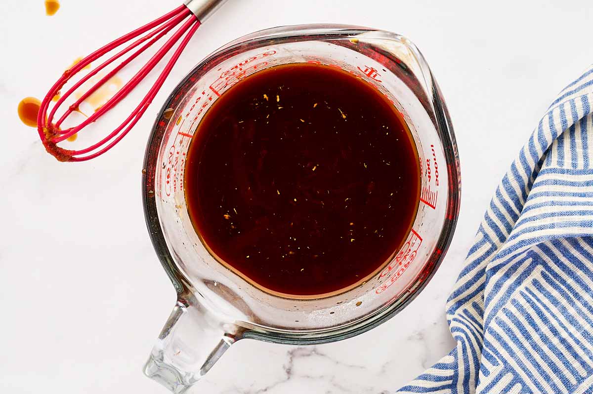 Sauce for stir fry in a measuring jug.