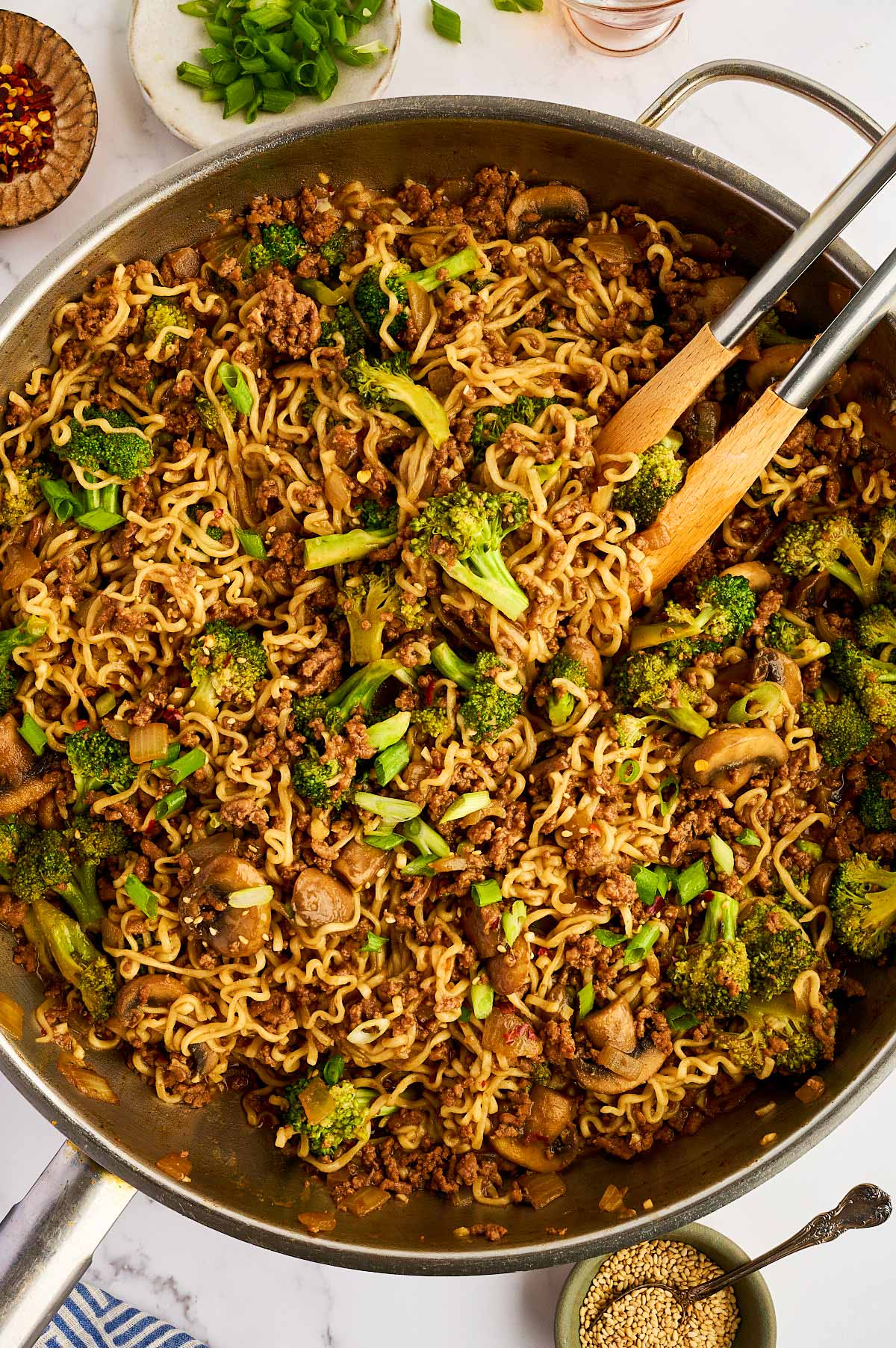 Skillet with ground beef and Ramen noodles.