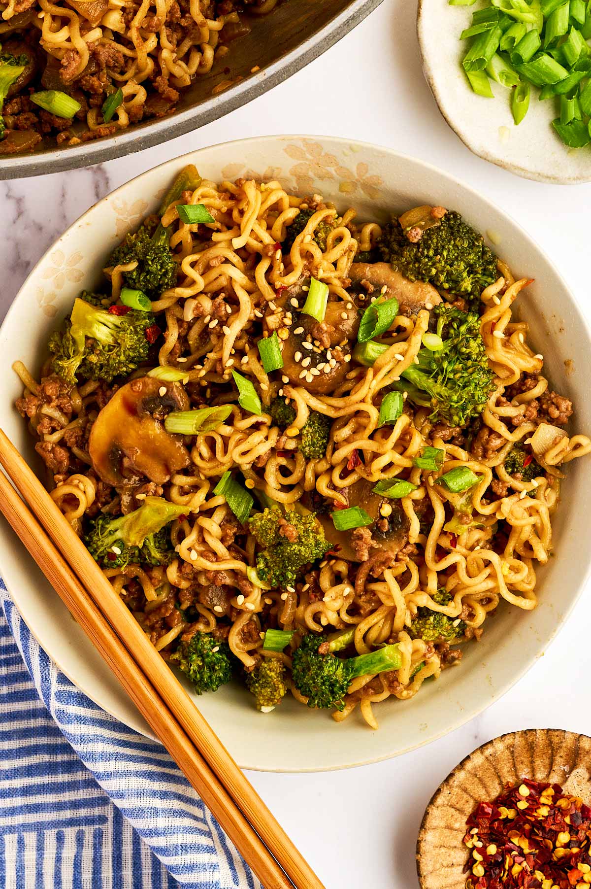 Bowl with ground beef and ramen noodles.