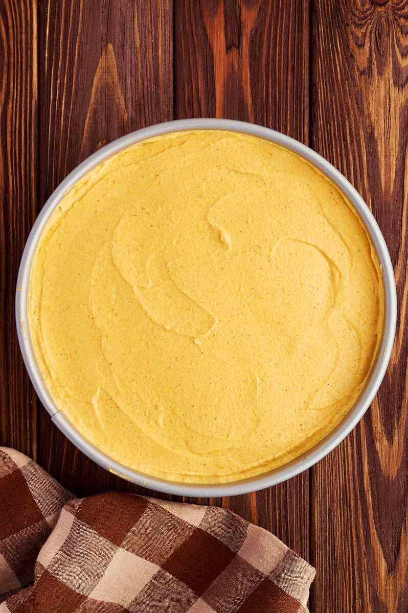 Undecorated no bake pumpkin cheesecake in a springform pan.