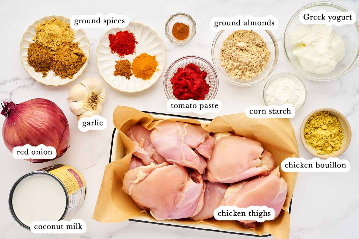 Ingredients for Slow Cooker Coconut Chicken with text labels.