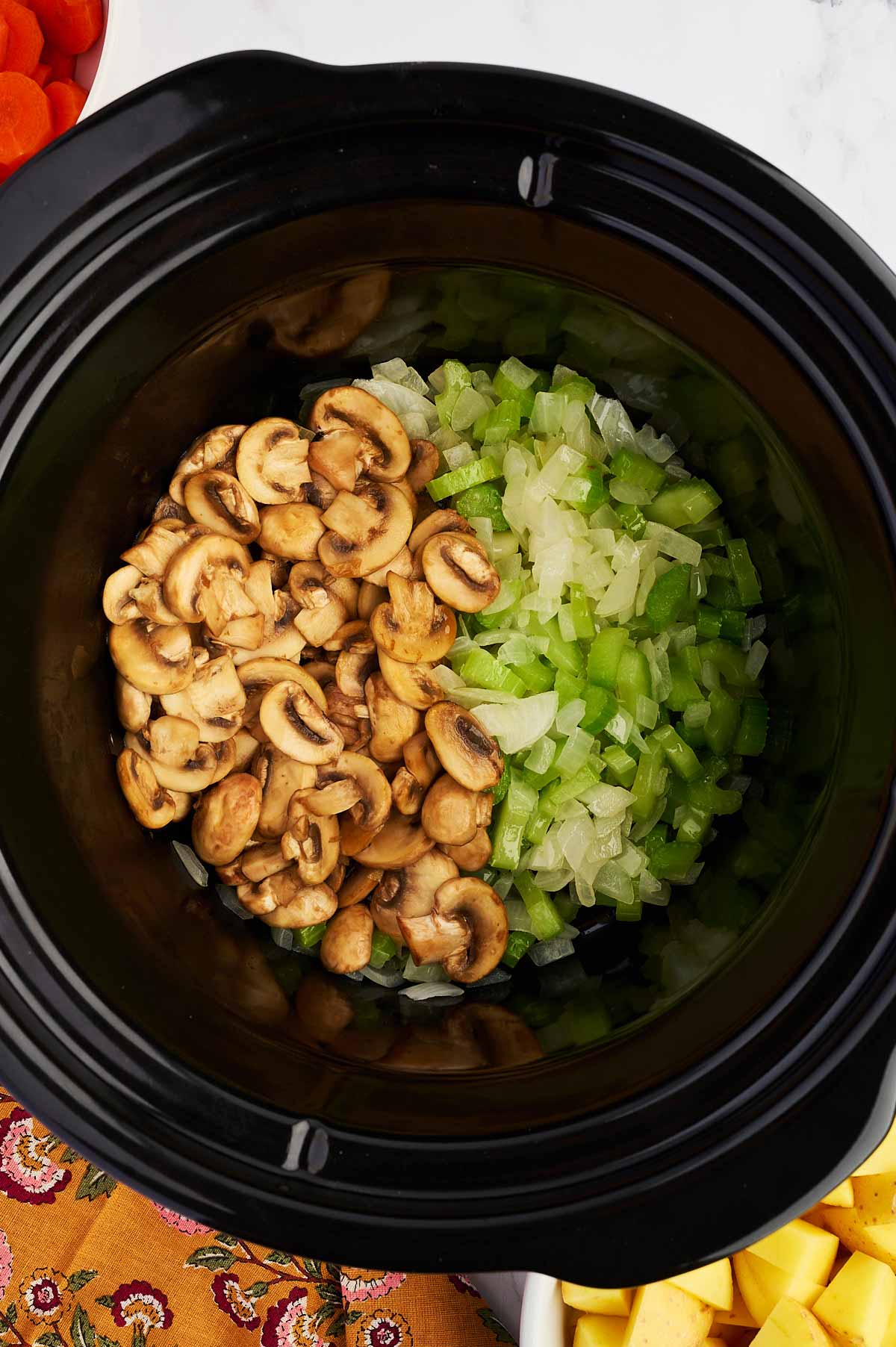 Sautéed onion, celery and mushrooms in slow cooker.