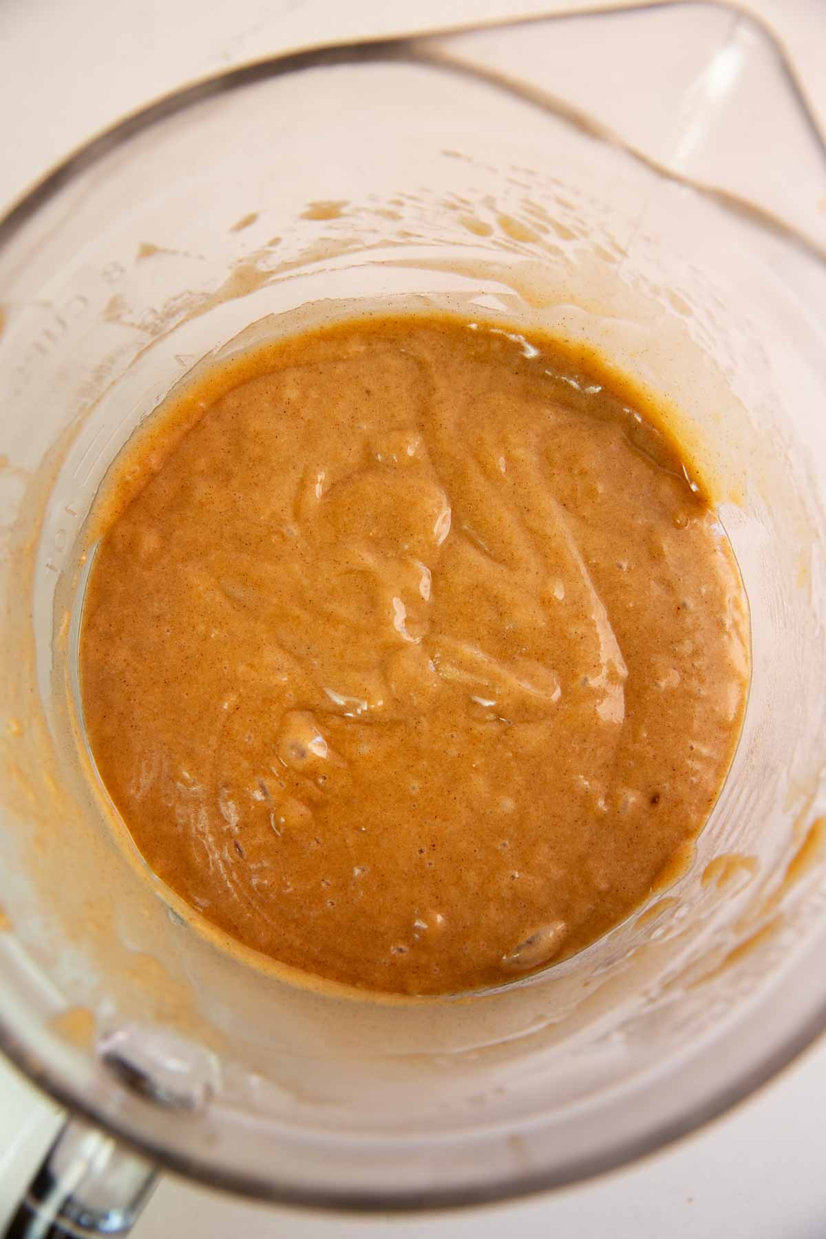 Batter for muffins in glass bowl.