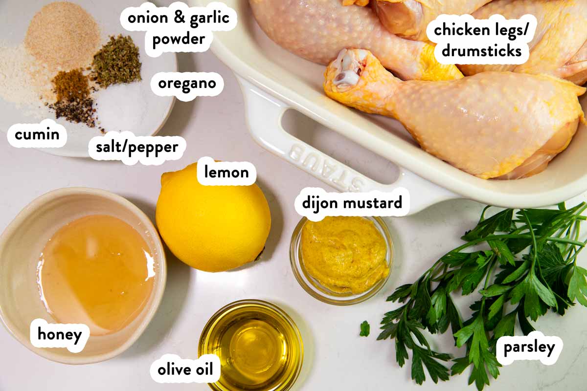 Ingredients for oven baked chicken legs with text labels.