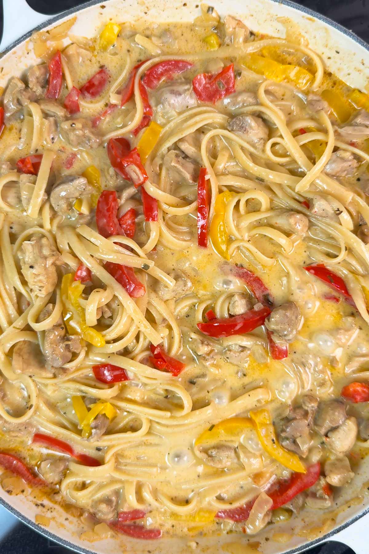 Creamy Cajun Chicken Pasta in a pan.