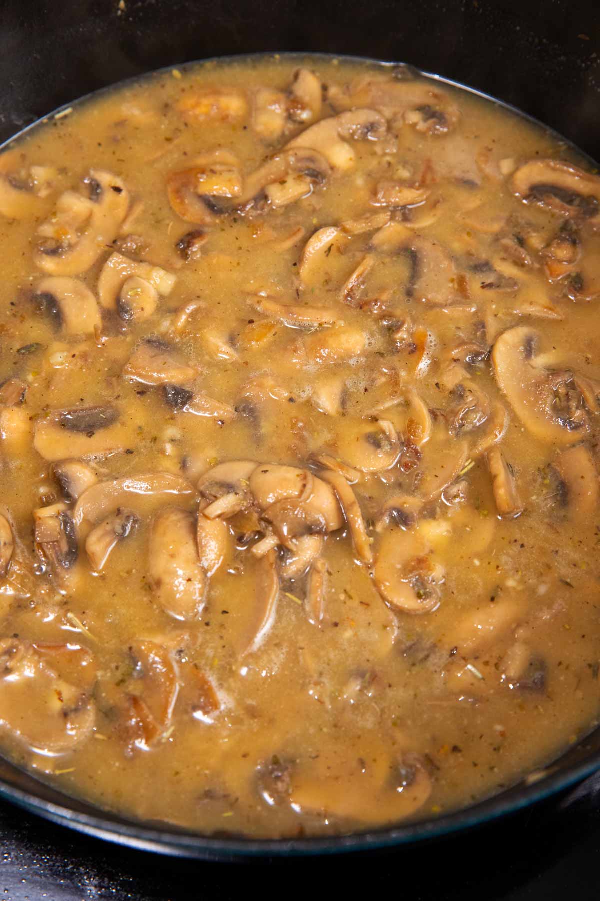Mushroom sauce in a cast iron skillet.
